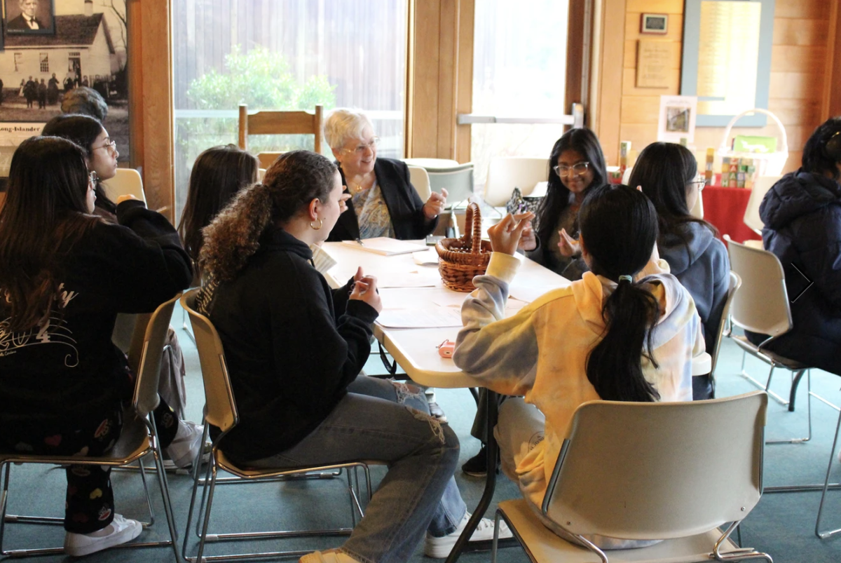 Students on the Walt Whitman Birthplace Association field trip engage in poetry exercises and take a tour of Walt Whitman's home as a young child. 